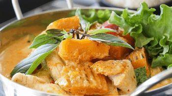 Pumpkin Curry · Tender chunks of pumpkin, bell pepper and basil stewed in red curry sauce, served with your ...