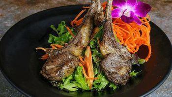 BBQ Lamb · Grill marinated lamb served with  salad and spicy home made sauce.   Please note: This dish is NOT gluten free.