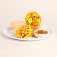 Loaded Breakfast Quesarito · Load 'er up. Scrambled eggs, melted cheese, tater tots, avocado, and salsa wrapped up in a q...