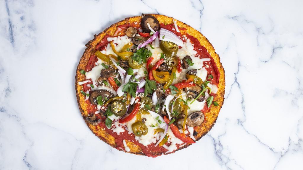 Vegan Wonders of the World · Delicious and healthy vegan pizza crust topped with marinara sauce, seasonal vegetables, and vegan mozzarella cheese.