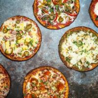 Build Your Own Pizza · Choose from an assortment of vegan toppings and vegan cheeses to build your own pizza!