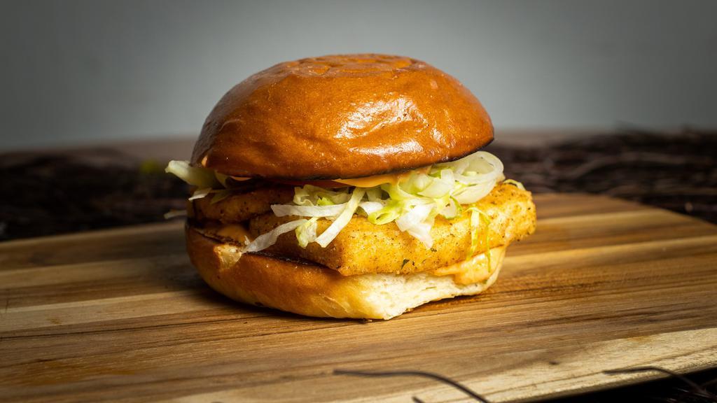 Tofu-Riffic · Love animals? Get a crispy fried tofu patty served in a griddled brioche bun and topped with sliced tomatoes, shredded green leaf lettuce, jalapeños, and Nashville hot sauce.