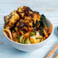 It's Cauli Time · Clay pot caramelized cauliflower, shredded lacinato kale, and cucumber served with your choi...