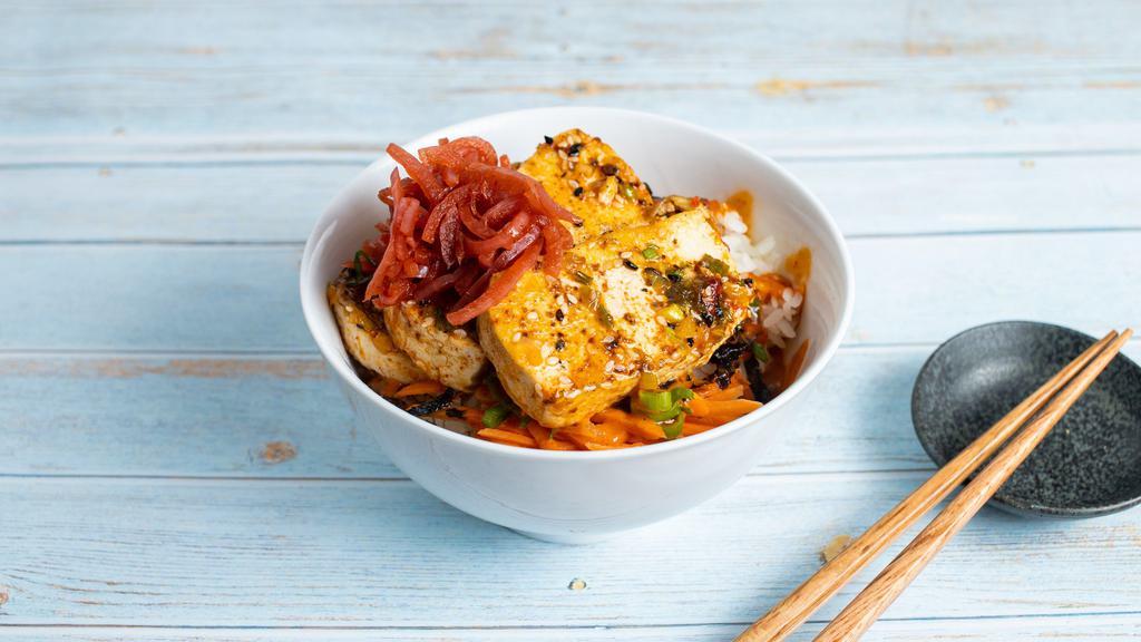 Planet Friendly · Korean braised tofu with pickled red onions served with your choice of rice (white, brown, cauliflower), pickled carrots, kimchi, seasoned seaweed, green onions and a squirt of spicy gochujang sauce.