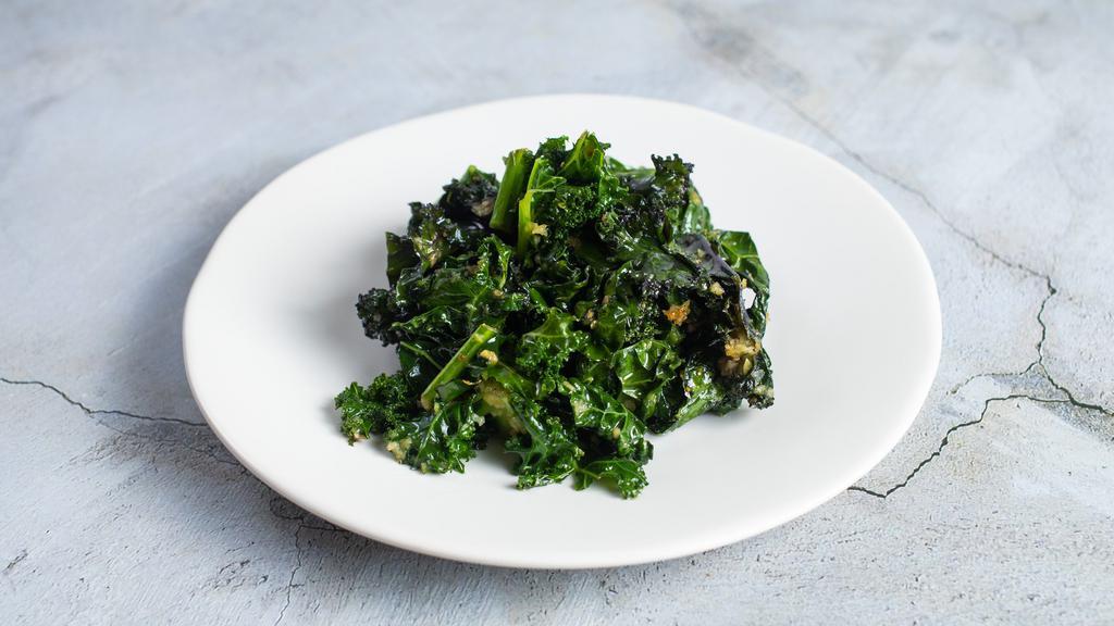 Kale to Action · Lacinato kale sautéed in olive oil, garlic, and finished with a squeeze of lemon.