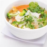6 Vegan Pho · Veggie noodle soup with broccoli, tofu, cauliflower, mushroom, carrot, daikon, onions, and s...