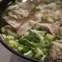 5 Steak & Meatballs Pho · Beef noodle soup with sliced rare steak, beef meatballs, onions, and scallions.