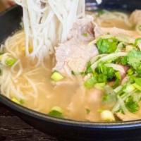7 Beef Meatballs Pho · Beef noodle soup with beef meatballs, onions, and scallions.