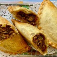 Spicy Beef - Carne Picante · Succulent, mildly spiced empanadas filled with organic ground beef, green and red bell peppe...