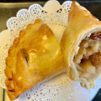 Apple Hand Pie · Heartly slices of Fuji apples, organic brown sugar, raisins, cinnamon, & rolled oats come to...