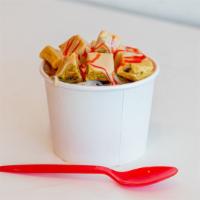 Falooda Kulfi · Traditional kulfi and ice cream topped with rabri and falooda noodles and basil seeds.