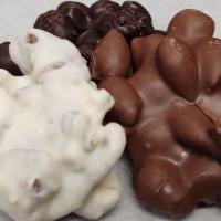 Nut Clusters  · Nuts and milk, dark or white chocolate.