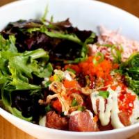 Ahi Tuna Bowl · Choice of sashimi, seaweed & imitation crab salad, wonton crisps, wasabi mayo, masago, soy g...