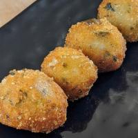 Fonio Arancini · Fonio arancini balls (4) fonio pudding-like base mixed with cheese, scallion coated with fon...