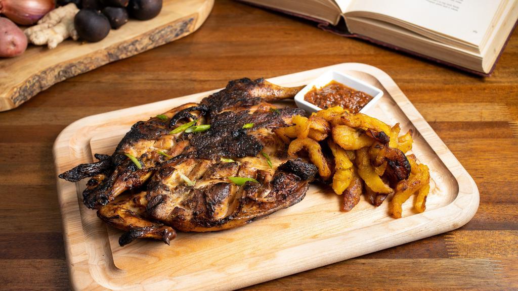 Shoukuya Cancancan Chicken® Whole Chicken · Served with flamed-grilled onions & tomatoes, prebiotic dip. Served with either Alloko or Attieke.