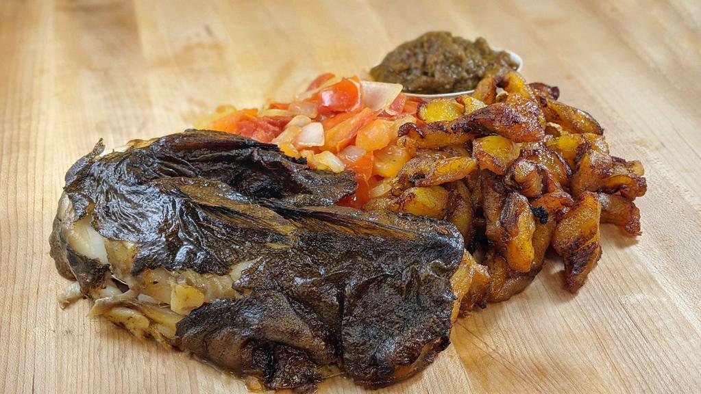 Shoukuya CanCanCan ® Black Cod Steak  · Black Cod Steak with bones. Marinated in our proprietary flavorful sauce and grilled in a tandoor oven served with alloko or attieke, and flamed-grilled onions & tomatoes,  3-5 people –a fish like you never had.