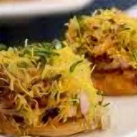 Sev Puri · 7 pieces. Ingredients: made with potato, sev, green and red sauce.
