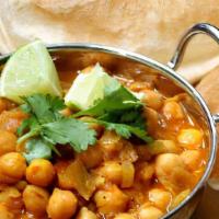 Chole Puri · 2 Piece. Ingredients: Chick peas, onions, tomatoes, ginger, garlic, chopped and home made ma...
