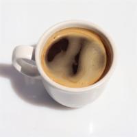 Americano · Two shots espresso over hot water.