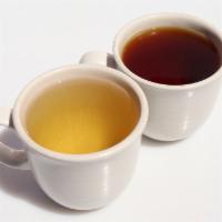 Tieguanyin Oolong · Sweet and floral with lingering buttery finish.