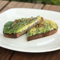 Avocado Toast · Ricotta, poppy seeds, citrus oil & poblano chili powder.