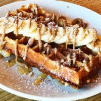 Almond Butter & Banana Waffle · With chopped almonds and honey.
