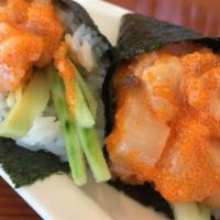 Salmon Skin Hand Roll · Cooked salmon skin, tobiko and radish sprout with teriyaki sauce.