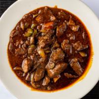 7. Hot Zigni Kei Wot · Spicy. Delectable beef chunks and simmered in red pepper sauce and lanced with exotic home m...