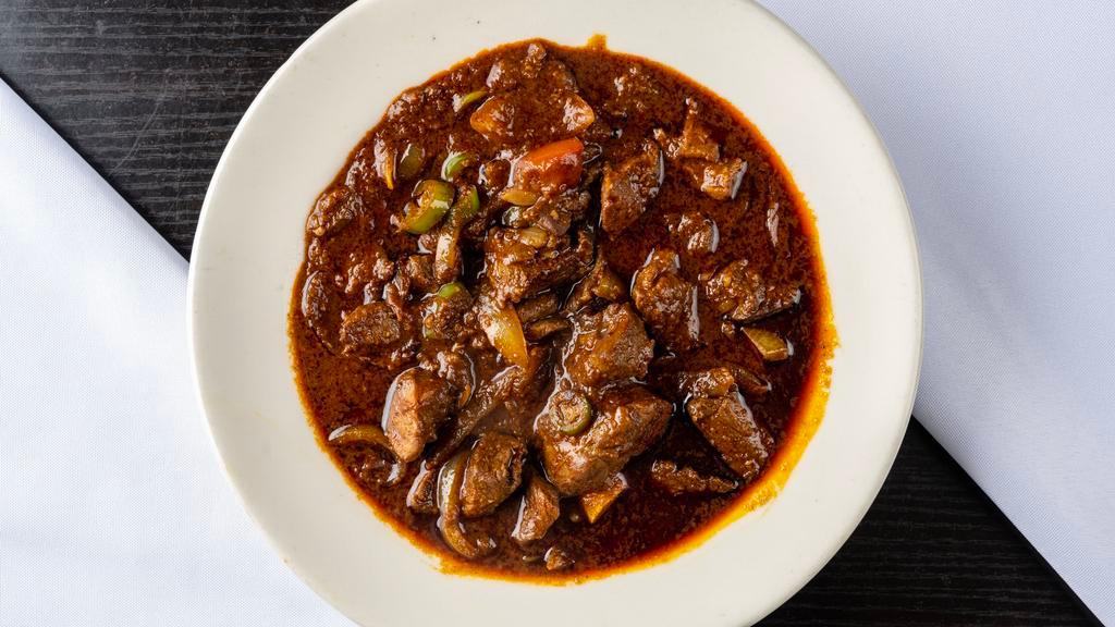 7. Hot Zigni Kei Wot · Spicy. Delectable beef chunks and simmered in red pepper sauce and lanced with exotic home made spices.