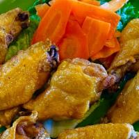 Canh Ga Chien Nuoc Mam (8) · Fried chicken wings with chilli fish sauce.