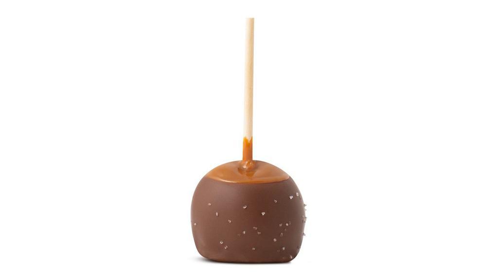 Milk Sea Salt Caramel Apple · Caramel-covered granny smith apple dipped in milk chocolate, sprinkled with sea salt.  **WE DO NOT RECOMMEND ASKING FOR THE APPLE TO BE SLICED AS IT WILL START TO TURN ABOUT 15-20 MIN AFTER SLICING.**