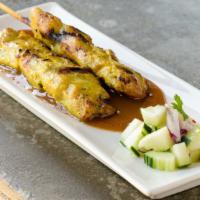 Satay Gai · Grilled Chicken Skewers served with satay peanut sauce & cucumber relish