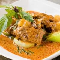 Kang Ped Bpet Yang · Roasted duck breast & baby bok choy in pineapple red curry