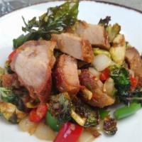 Gra Prao Moo Grob · House-made crispy pork belly, brussel sprouts wok-fried with spicy garlic & fresh basil