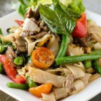Pad Kee Mao · Stir-fried wide rice noodles, yard long beans, egg, and skirt steak with thai basil and chili