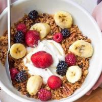 Oatmeal Bowl with fruit, honey, granola, and oatmeal · Bowl with fruit, honey, granola, and oatmeal