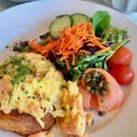 Oeufs Brouilles (Salmon Scrambled Eggs Brouillés) · Salmon and scrambled eggs on a croissant with seasonal side salad and capers.