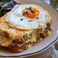 Croque Madame with Ham · Cheese croque with ham, egg, gruyère cheese, and béchamel sauce on house baked pain de mie b...