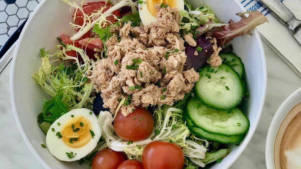 Nicoise Tuna Salad · Wild caught tuna, tomato, egg, potatoes, and olives.