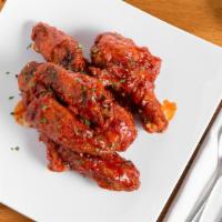 (HALF) Crispy Yangnyeom Chicken · Crispy fried chicken tossed in a sweet and spicy red sauce.