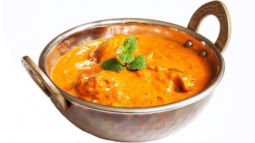 Chicken Tikka Masala · Chunks of roasted marinated boneless chicken in a spiced creamy curry sauce.