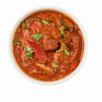 Chicken Vindaloo · Marinated chicken in a spiced curry sauce with potatoes