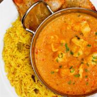 Chicken Korma · A marinated chicken dish with spices, nuts, yogurt, and vegetables.