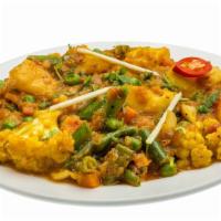Mixed Vegetables Masala · Farmers market vegetables cooked in a light curry sauce.