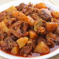 Lamb Vindaloo · Tender marinated lamb in a spiced curry sauce with potatoes.
