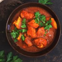 Mild Chicken Tikka Masala · Chunks of chicken that are marinated in a yogurt and spice mixture, roasted in a tandoor, an...