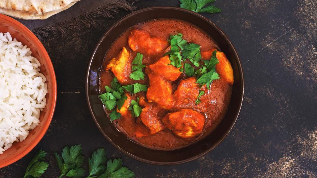 Mild Chicken Tikka Masala · Chunks of chicken that are marinated in a yogurt and spice mixture, roasted in a tandoor, and served in a rich tomato-based sauce. Chef recommends garlic naan for the mild chicken tikka masala.