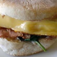 Bacon Gouda Breakfast Sandwich · Organic tofu, soy bacon, sauteed spinach, vegan Gouda cheese, and vegan mayo on an English m...
