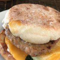 Sausage Breakfast Sandwich · Organic tofu, soy sausage, vegan cheddar, and vegan mayo  on an English muffin.