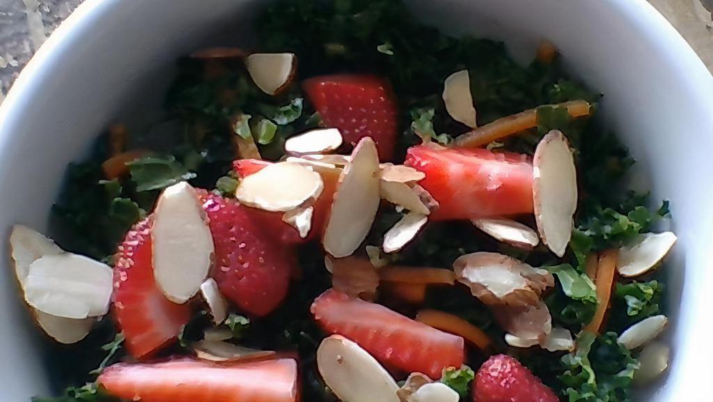 Green Salad · Massaged kale salad with almonds, strawberries, and Balsamic dressing